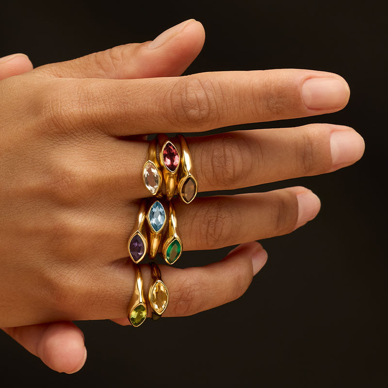 Iris Ring, Garnet, 9kt Yellow Gold