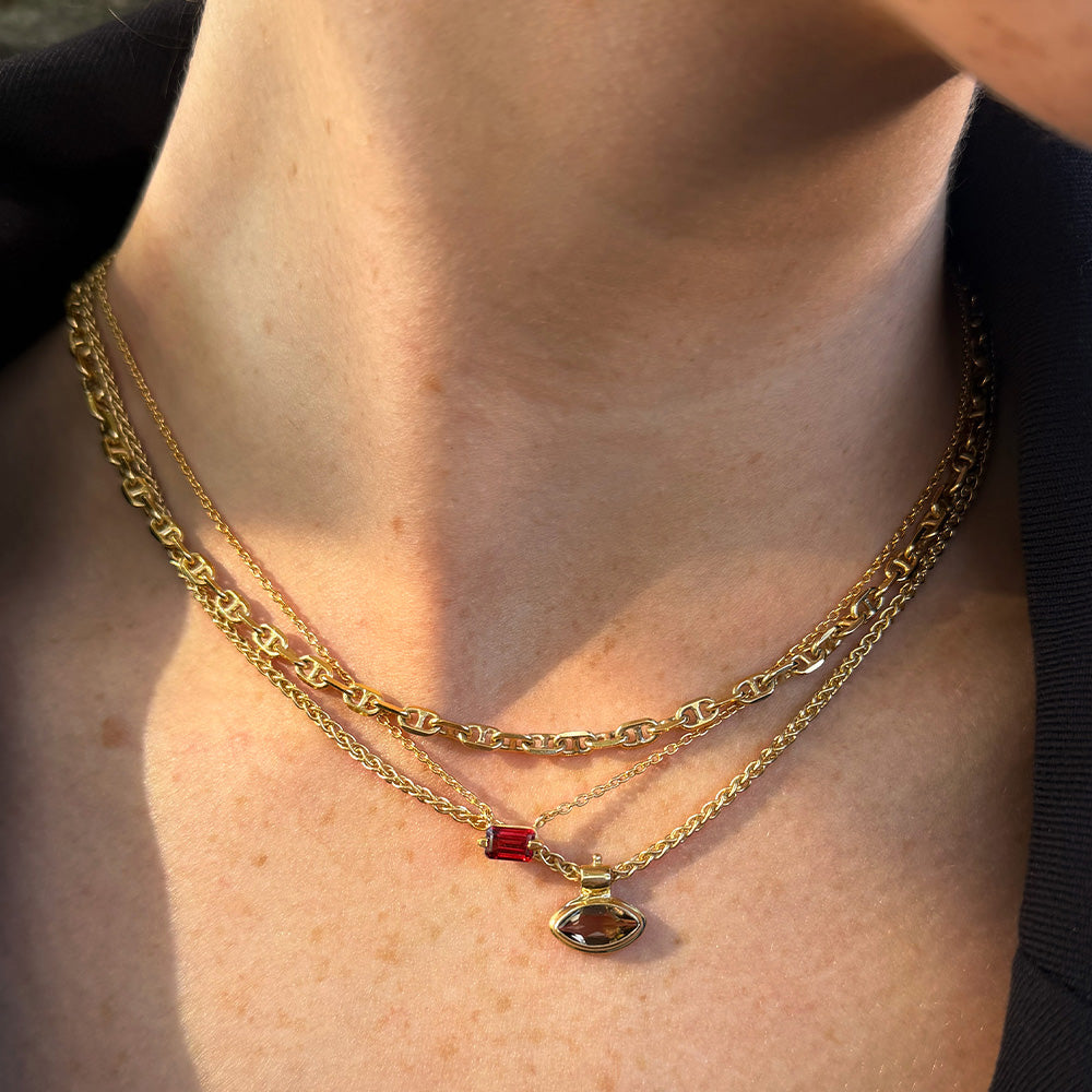 Iris Brown Smokey Quartz Necklace styled with Baguette Red Garnet Necklace. 18kt gold vermeil necklace stack