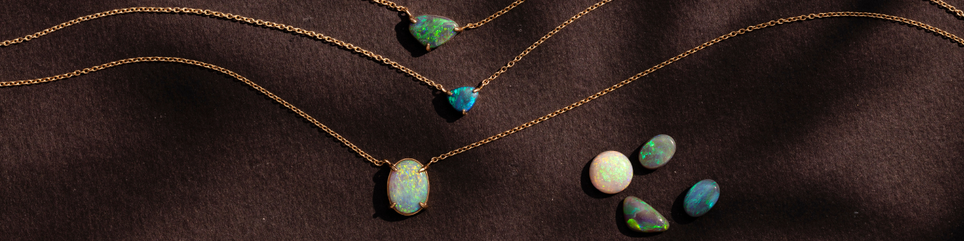 Stone best sale gold jewellery